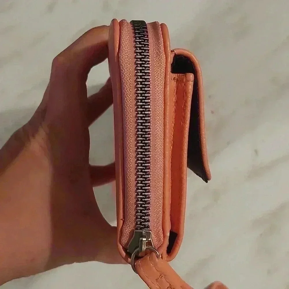 NWOT TAHARI PINK WRISTLET WALLET WITH IDENTITY PROOF LINING